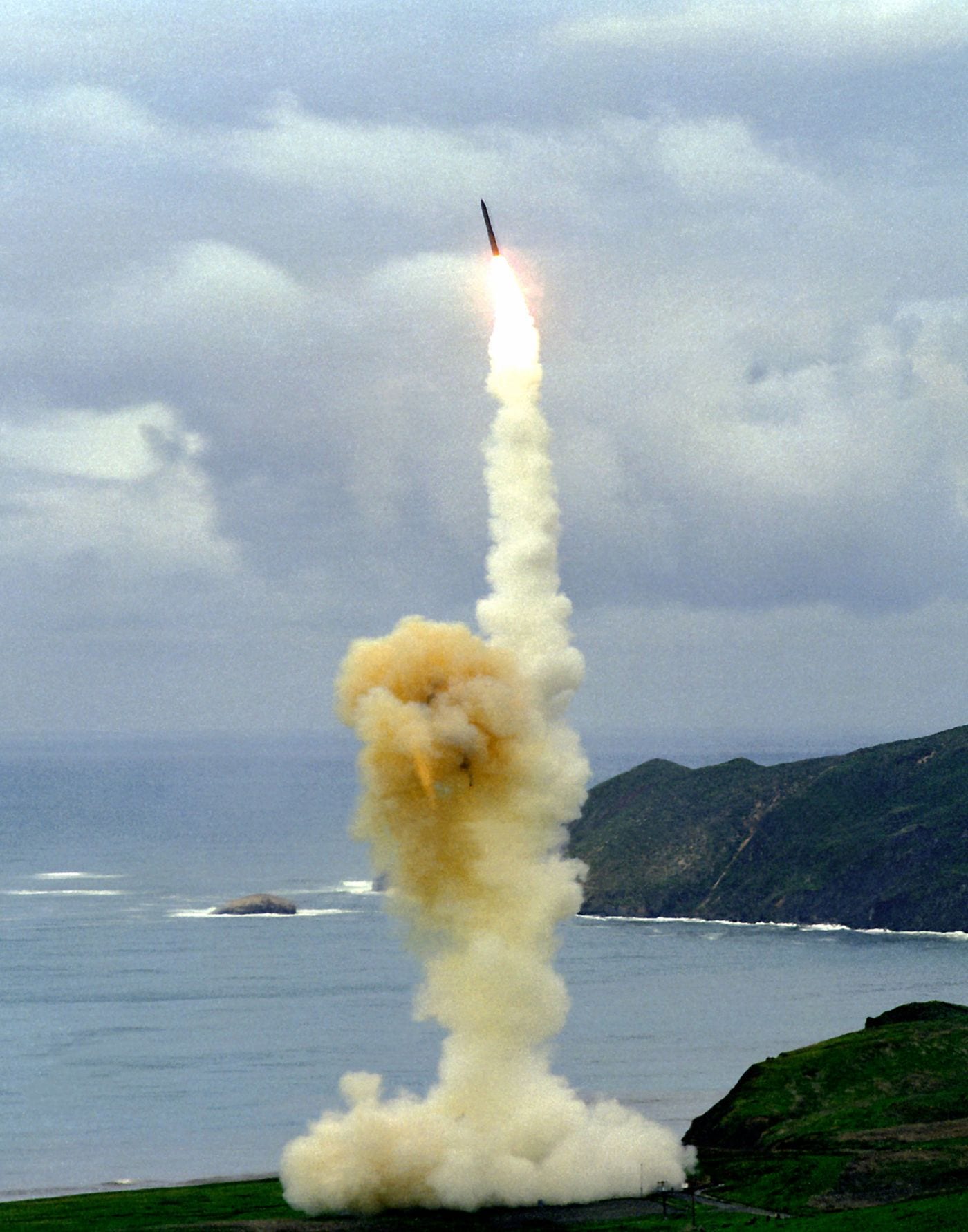 An LGM-30 Minuteman III missile soars in the air after a test launch from Vandenberg Air Force Base. The Minuteman is a strategic weapon system using a ballistic missile of intercontinental range. (U.S. Air Force)